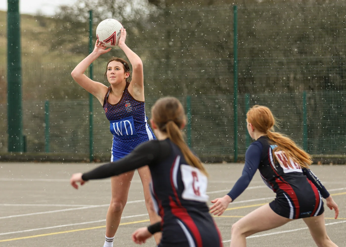 Barnard Castle School pupils playing netball.