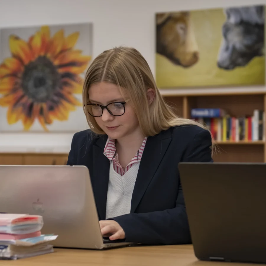Barnard Castle School sixth form pupil with her laptop.