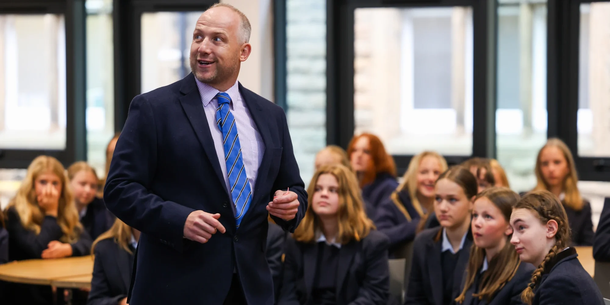 Barnard Castle School teacher in a classroom full of students.